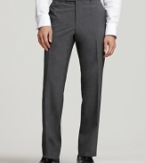 BOSS Black James Brown Trousers. Flat front pants in stretch fabric. 11 front rise, 18 leg opening. Double hook front tab closure. Side seam pockets, back buttoned welt pockets. In virgin wool elastane, cotton-lined to knee.