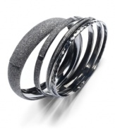 This set of 4 bangle bracelets from Style&co. adds versatility to your look with textured accents. Crafted in hematite tone mixed metal. Approximate diameter: 2-5/8 inches.