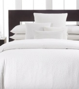 Sleep in luxury. Complement the Mykonos bedding collection from Calvin Klein with these pillowcases, featuring soft 300-thread count combed cotton percale in a dreamy cream hue.