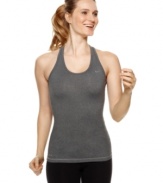 Dri-FIT technology and a long slim fit give this Nike tank top moisture-wicking technology and comfortable coverage for your toughest workouts.