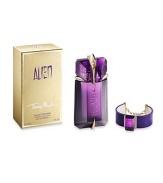 Indulge yourself with the ALIEN fragrance and Thierry Mugler fashion. Included in this purchase of an ALIEN 2 oz. Eau de Parfum Refillable Spray is a genuine leather signature Mugler bracelet featuring a faceted purple glass stone and golden accents. The perfect gift for any Goddess. 