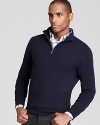 Crafted in cashmere for unparalleled softness, this handsome half-zip sweater solidifies your attire with luxe polish and masculine appeal. Pair it with a patterned button-down for an unbeatable combination.