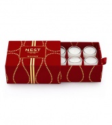 Captures the aroma of a sparkling holiday season. A total of six votives per box fragranced with inviting notes of pomegranate, mandarin orange, pine, cloves and cinnamon. Housed in elegant miniature glass vessels and presented in a red velvet box. Created by Laura Slatkin. Approximately 2 to 3 hours of burn time per votive.