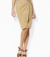 An elegant blend of urban-chic style and rustic heritage, Lauren by Ralph Lauren's skirt is crafted from soft, sumptuous Italian goat suede in a modern faux-wrap silhouette.