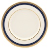 Inspired by privately commissioned presidential dinnerware, this fine china features stately navy bands and a gold border etched with patriotic stars.