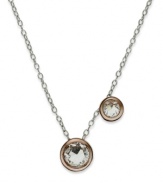 Add an effervescent aesthetic to your look. Studio Silver's light and airy pendant combines two crystal bubbles in an 18k gold over sterling silver bezel setting. Chain crafted from sterling silver for a unique two-tone look. Approximate length: 18 inches. Approximate drop: 1/4 inch.