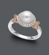 The perfect complement for the contemporary woman. This sophisticated Belle de Mer design incorporates a single cultured freshwater pearl (7-7-1/2 mm), round-cut diamond accents, and round-cut pink sapphire accents. Crafted in 14k white gold and 14k rose gold.