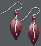 Add red-hot flair to your look in Jody Coyote's leaf-shaped earrings. Crafted in sterling silver, earrings feature red patina bronze drops and sparkling red crystals. Approximate drop: 1-1/2 inches.