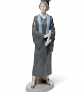 Celebrate your daughter's commencement with this porcelain figurine from Lladró. Clad in robe and mortarboard, diploma in-hand, this proud graduate represents the hardworking scholar in your life.