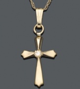 Polished 14k gold with a diamond accent at center create a stunning cross pendant, perfect for a child's first necklace. Approximate length: 15 inches. Approximate drop: 3/4 inch.