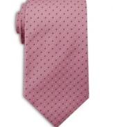 Adding some visual depth to a monochromatic tie, this printed pattern easily complements a solid color button-down shirt.