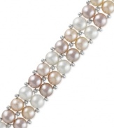 A colorful classic. This sterling silver two-row bracelet brings a stylish touch to any occasion with peach and pink button cultured freshwater pearls (6-1/2-7 mm). Approximate length: 8 inches.