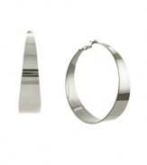 Looking for a hoop style with a twist? Vince Camuto takes the traditional hoop earring to a new level with a slightly tapered edge. Crafted in silver tone mixed metal. Approximate diameter: 2 inches.