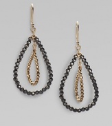 14K gold and oxidized sterling silver beading in a concentric hoop design.14K gold Oxidized sterling silver Length, about 1½ French earwires Made in USA 