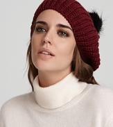 Top off your cold-weather look with this chic, slouchy beret from Eugenia Kim. A pom pom adds playful edge.