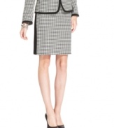 How does Tahari by ASL make classic houndstooth-checked fabric look new? Combine it with a streamlined pencil skirt silhouette and frame it with contrasting solid trim.