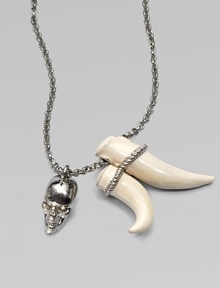 Swarovski crystal accented skull and tusk-shaped pendants on a link chain. BrassSwarovski crystalsLength, about 27Pendant size, about 2 and 1½ Lobster clasp closureMade in Italy