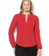 Lauren Ralph Lauren's long-sleeved plus size blouse in a breezy silhouette is accented with a flirty keyhole opening at the front and finished with a hidden placket for a modern update to a wardrobe must-have.