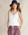 A classic tank top gets a girly makeover with eyelet lace trim at the neckline and straps, from Tommy Hilfiger.