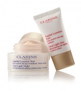 Clarins' exclusive pioneer plant extracts help defy dark spots, dullness and wrinkles for a smooth, unified skin tone. Visibly lifts, firms and restores the deep luminosity of young-looking skin. Duo includes: Full-size Vital Light Night Revitalizing Anti-Aging Cream and travel-size Vital Light Day Illuminating Anti-Aging Cream. Made in France. 