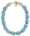 Chunky is in. Make a statement in this not-so-subtle style by Michael Kors. Large, reconstituted turquoise nuggets attract attention to your neckline, while a gold tone mixed metal toggle clasp keeps it secure. Approximate length: 18 inches.