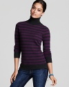 Bundle up with effortless chic in this C by Bloomingdale's striped sweater rendered in plush cashmere.