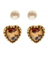 Refinement meets rock n' roll. Betsey Johnson combines the best of both worlds with this stylish set of simulated pearl and leopard-print heart shaped stud earrings. Crafted in gold tone mixed metal, they come with a gift box. Approximate diameter: 1/4 inch (imitation pearl studs), 1/2 inch (heart studs).