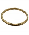 Simply stylish. A hammered surface adds intriguing textural detail to this chic bangle bracelet from T Tahari's Essentials Collection. Crafted in antique gold tone mixed metal (and nickel-free for sensitive skin), it looks great on its own or layered. Approximate diameter: 2-1/4 inches.