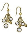 Crystal clear drops, by Alfani. These timeless chandelier earrings from Alfani emit a golden shine complemented by clear plastic beads. Crafted in gold tone mixed metal. Approximate drop: 2 inches.