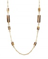 Neutral tones add a touch of warmth to your look. Lauren by Ralph Lauren necklace features trendy tortoise shell accents set in a delicate gold tone mixed metal chain. Approximate length: 36 inches.