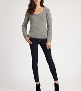 Alpaca-rich scoopneck, crisp and cool, has an alluring semi-sheer back. Scoopneck Long sleeves Semi-sheer back 68% alpaca/22% nylon/10% merino wool Dry clean Imported