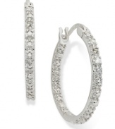 A girl can never have too much sparkle. Victoria Townsend's stunning hoop earrings are set in sterling silver with round-cut diamond accents that truly dazzle. Approximate diameter: 1 inch.