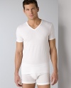 Emporio Armani stretch cotton V-neck. Tagless V-neck tee with eagle logo sealed on the chest.