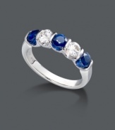 Sweet, contrasting sparkle will liven up your look in an instant. This vivid ring features channel-set white and blue sapphires (1-3/4 ct. t.w.) that shine in a sterling silver setting. Size 7.