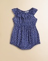 Pretty polka dots adorn this soft, sweet romper in a charming bubble shape.Wide elastic necklineFlutter sleevesPull-on styleElastic waistElastic leg openingsRayonMachine washImported