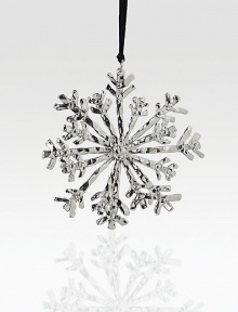 Elegant and timeless, this glistening snowflake form will beautifully adorn your tree.HandmadeNickelplate4 diam.Imported