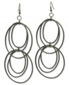 Ring in sophisticated style with GUESS. These multi-hoop earrings are crafted in hematite tone mixed metal with textured detail. Approximate drop: 4 inches. Approximate diameter: 1-3/4 inches.