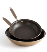 Heat up any stovetop with performance and style. Anolon's dynamic duo of skillets is crafted in bronze-hued, hard-anodized aluminum and finished with an exclusive nonstick coating for healthier meal preparation done with sumptuous style. Limited lifetime warranty.