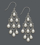 Pristine pearl drops add just the right amount of decoration. These chandelier-style earrings feature nine cultured freshwater pearls (6-6-1/2 mm) in a sophisticated sterling silver setting. Approximate drop: 2-1/4 inches.