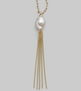 A striking white baroque pearl is the centerpiece of this delightful design, accented with a tassel of delicate gold chains. 16mm baroque, organic, man-made white pearl 18k gold vermeil Length, about 36 Made in Spain