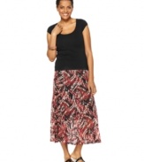 Channel island-chic style in this JM Collection skirt, featuring an on-trend midi length and chic abstract print. Try pairing it with a scoopneck tee and sandals!