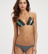 A fashion-forward, mix-and-match swim design featuring a glamorous floral top accented by lace details and a stretch bottom with a contrasting print.Halter strap ties at neckTriangle cupsPretty lace detailsBack tie closureStretch bottomFully lined80% polyamide/20% elastaneHand washImported