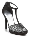 Woven rhinestone-embellished peeptoes on smooth satin t-straps are beguiling evening beauties. By Stuart Weitzman.