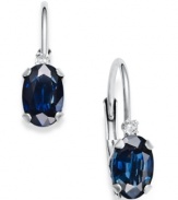 Cool off with the perfect shine. These petite drop earrings highlight oval-cut sapphires (1-1/4 ct. t.w.) and diamond accents in a 14k white gold leverback setting. Approximate drop: 1/2 inch.