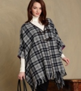 Make a sweeping statement in Tommy Hilfiger's plaid cape. Details like toggle closures and a fringed hem are so stylish, while the wool-blend fabric is so cozy.