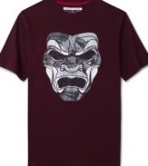 A cool mask graphic decorates the front of this comfortable Sean John crew neck tee.