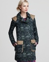 This cotton Gryphon coat in a rich twill is a fashion-forward choice for the new season. Flaunting epaulets, elbow seams, large front pockets a back kick pleat with snap detail, this unique design stands out against ubiquitous trench and pea coat styles.