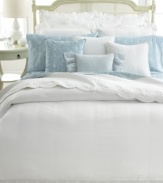 A vintage scroll pattern in a muted blue and white palette adorns these pillowcases from Lauren by Ralph Lauren for a traditional and elegant allure.