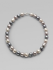 A soft melange of grey, nuage and white baroque man-made pearls creates drama at the neck. 14mm multicolor organic baroque pearls Length, about 20 Sterling silver spring clip clasp Made in Spain