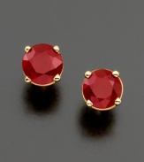 Light your look on fire. Round-cut rubies (1 ct. t.w.) add vivacity to an ordinary ensemble. Cradled in a polished, 14k gold four-prong setting for a truly classic look. Approximate diameter: 5 mm.